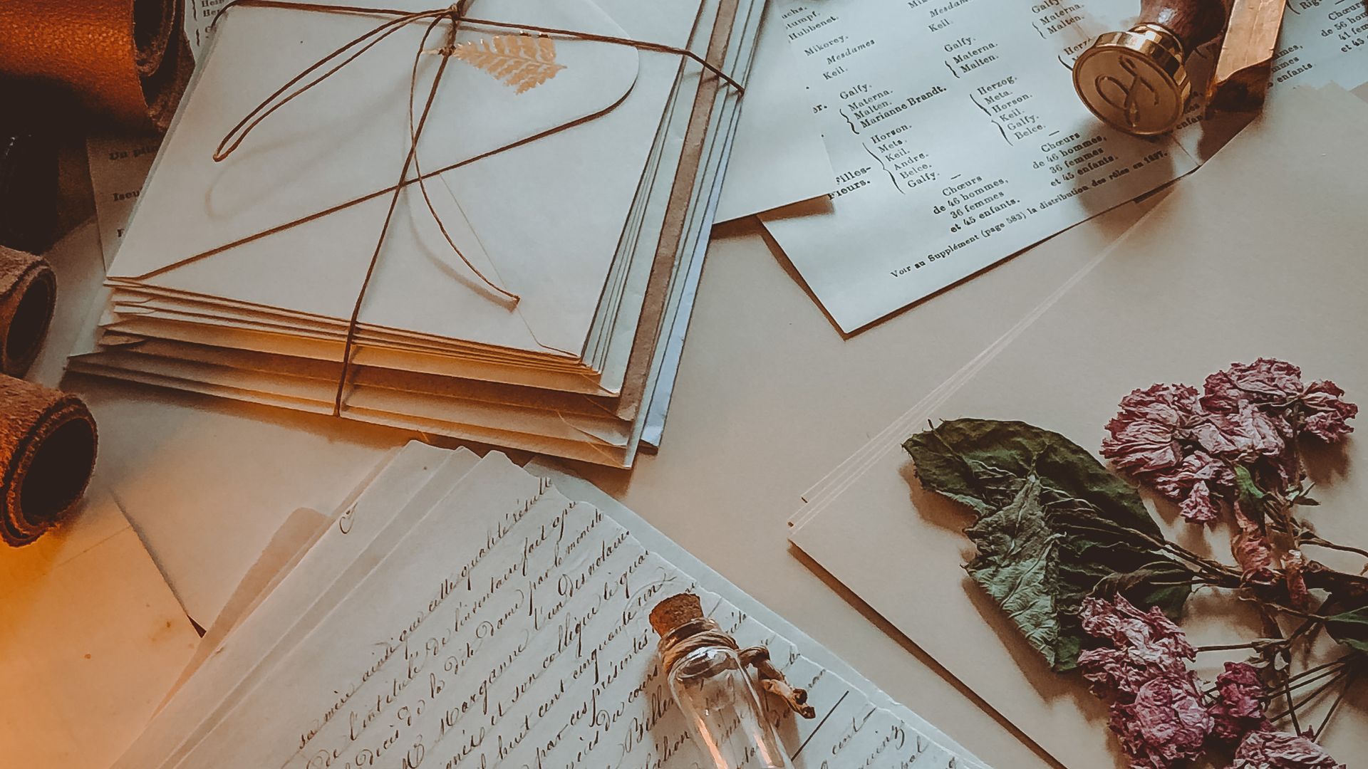 Letters and envelopes laid out on a desk